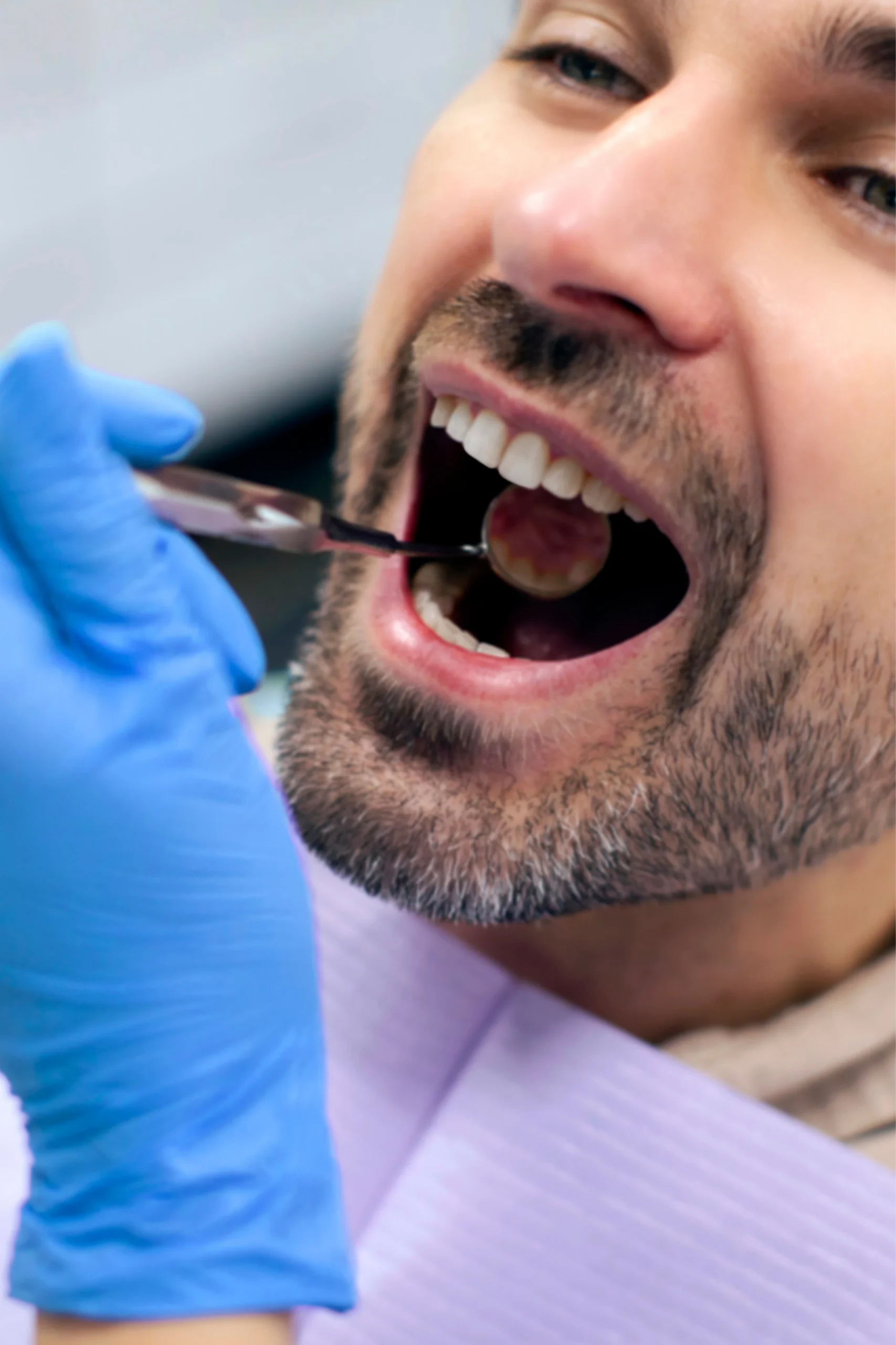 Dentist performing a dental check in Naperville IL